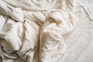Soft, cozy blanket on a bed