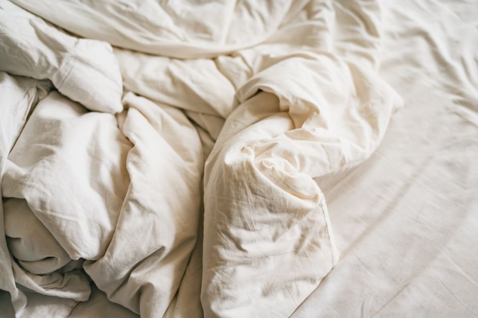 Soft, cozy blanket on a bed