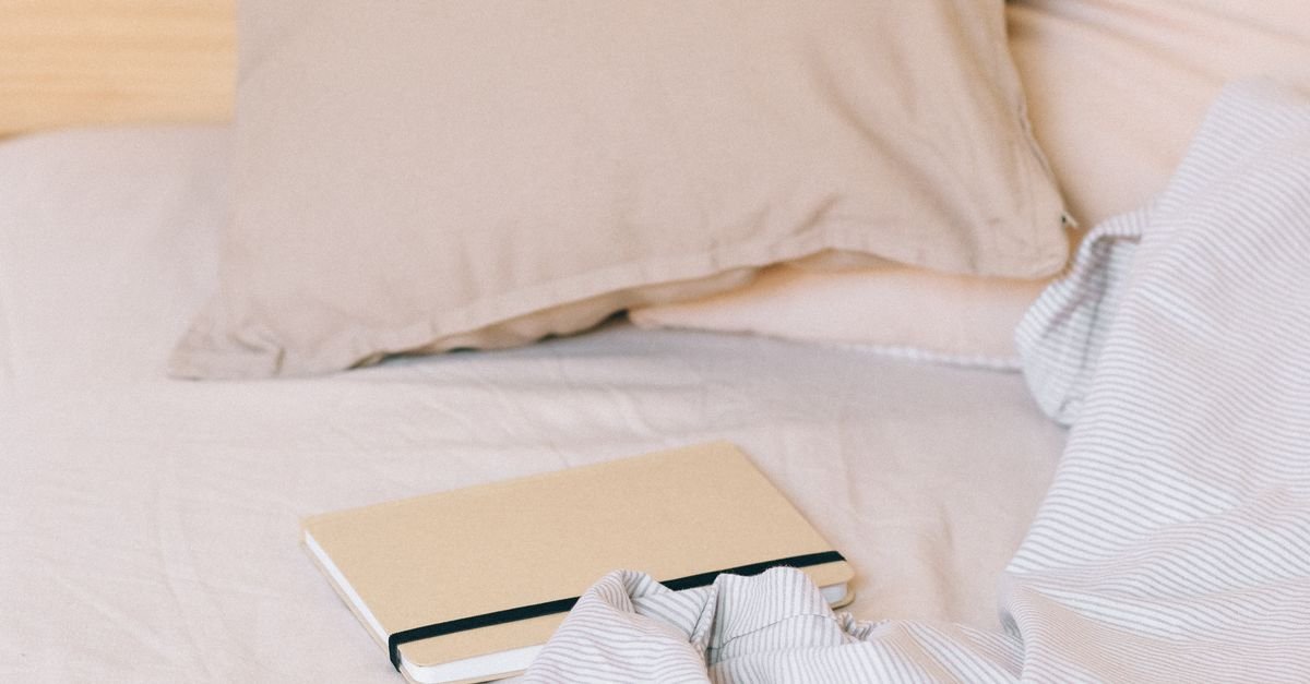 Cozy layered bedding with pillows