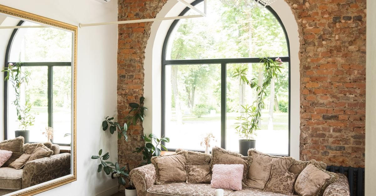 A large mirror expanding a living room