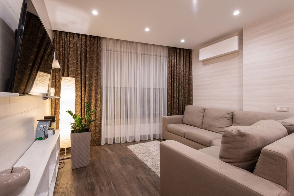 Modern air purifier keeping the air clean and fresh in a bright living room