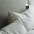 Comfortable pillows arranged on a cozy bed for better sleep