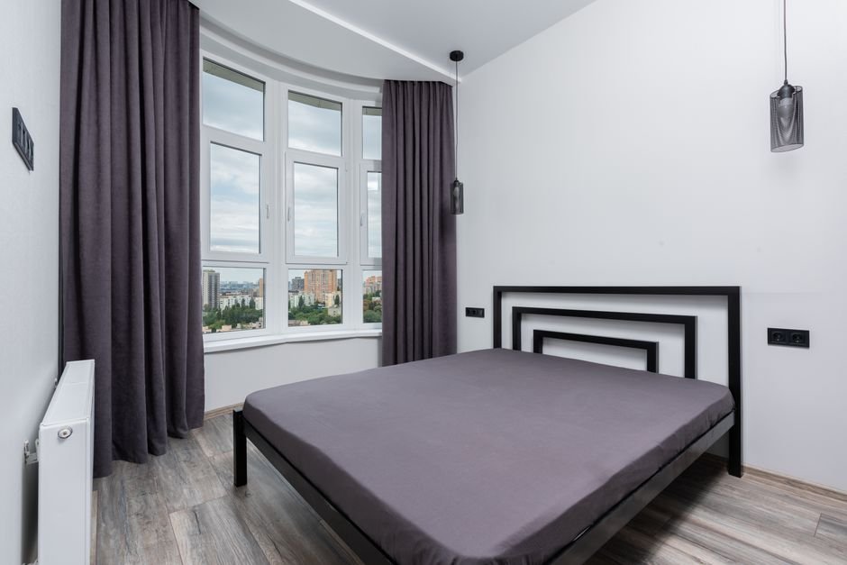 Blackout curtains keeping a cozy bedroom dark for better sleep Best Blackout Curtains 2026