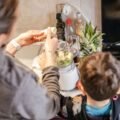 Blender making a fresh fruit smoothie in a modern kitchen