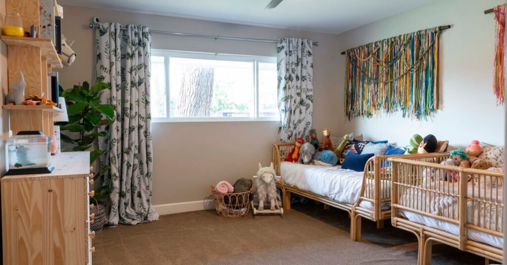 Bright toddler room with low bed and playful decor Bright toddler room with low bed and playful decor
