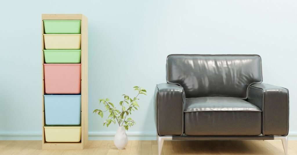 Pastel bin storage unit beside an armchair Pastel bin storage unit beside an armchair