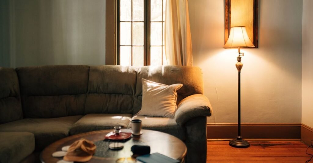 Warm lamp glowing in a cozy living room Warm lamp glowing in a cozy living room