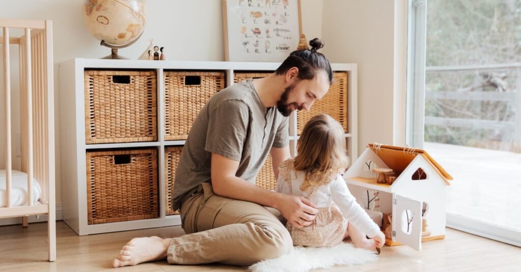 Parent and child playing beside cube storage