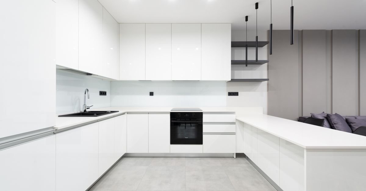 Modern white kitchen with cool bright lighting
