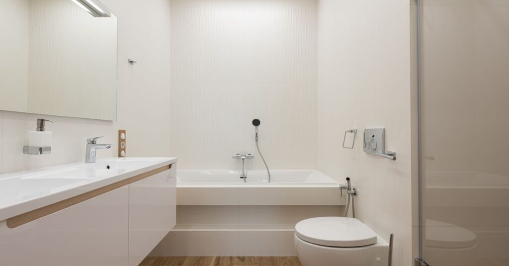 A clean modern bathroom with a bidet-ready toilet