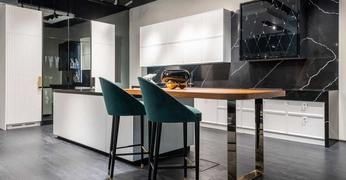 Upholstered bar stools at a modern island