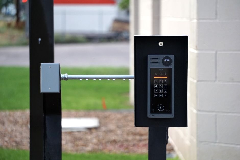 Smart video doorbell mounted on modern home entrance