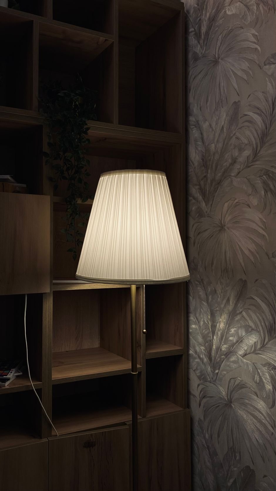 Tropical leaf textured wallpaper on an accent wall