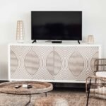 Bright living room with rattan furniture set and console Bright living room with rattan furniture set and console