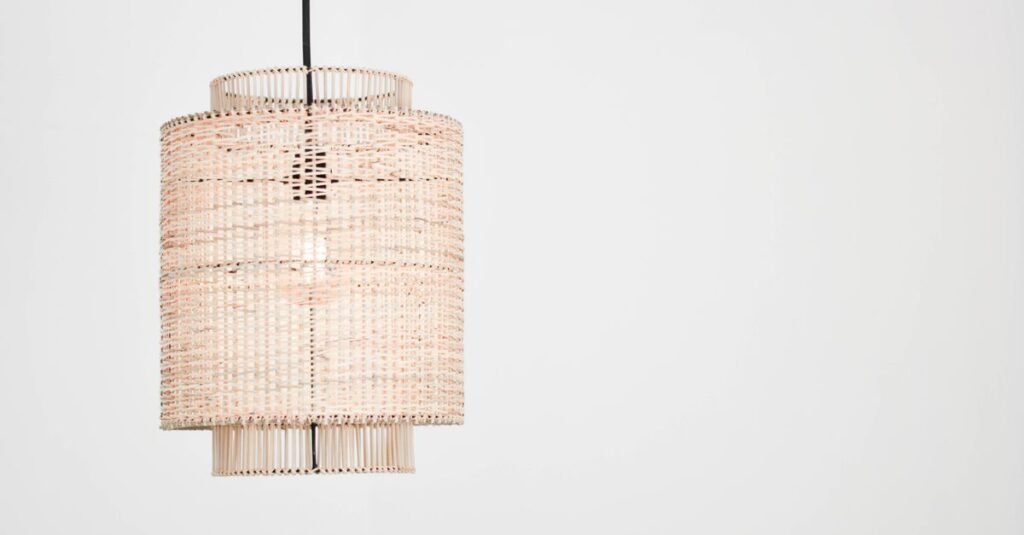 Woven rattan pendant lamp on white