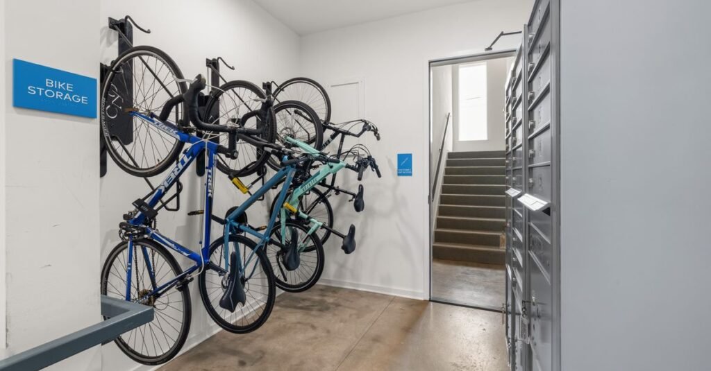 Bikes hanging on wall mounts in a clean room