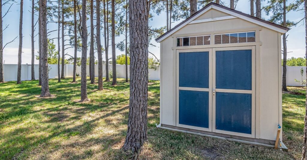 Backyard shed office among the trees