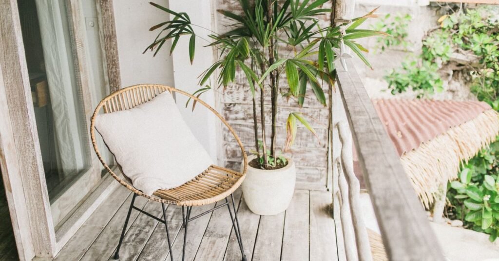 Balcony chair with plants and natural-fiber rug
